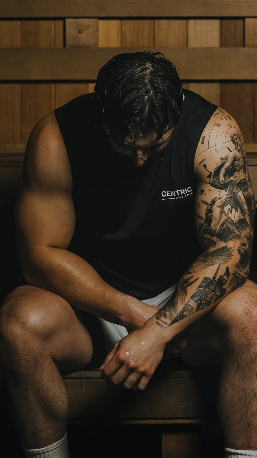Athlete resting in a sauna in a Centric Athlete Club tank